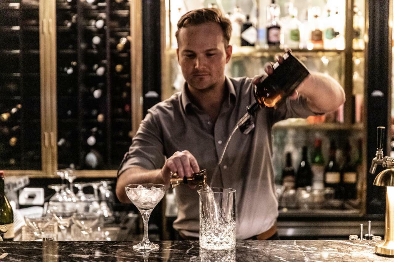 The Inchcolm By Ode Hotels Брисбен Экстерьер фото A bartender at work